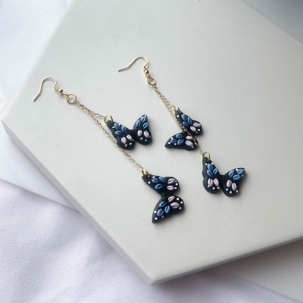 BLUE BUTTERFLY DANGLES