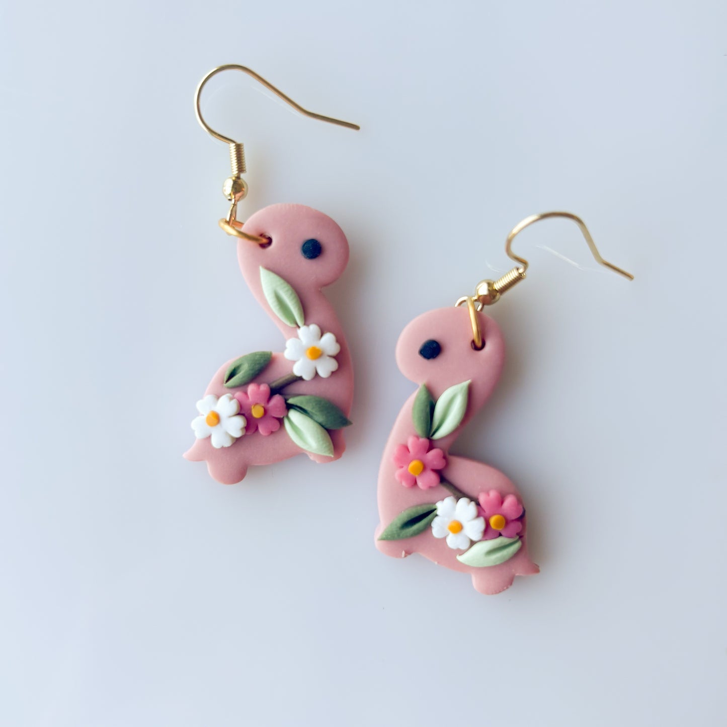 SAKURA DINO EARRINGS (BRONTO)