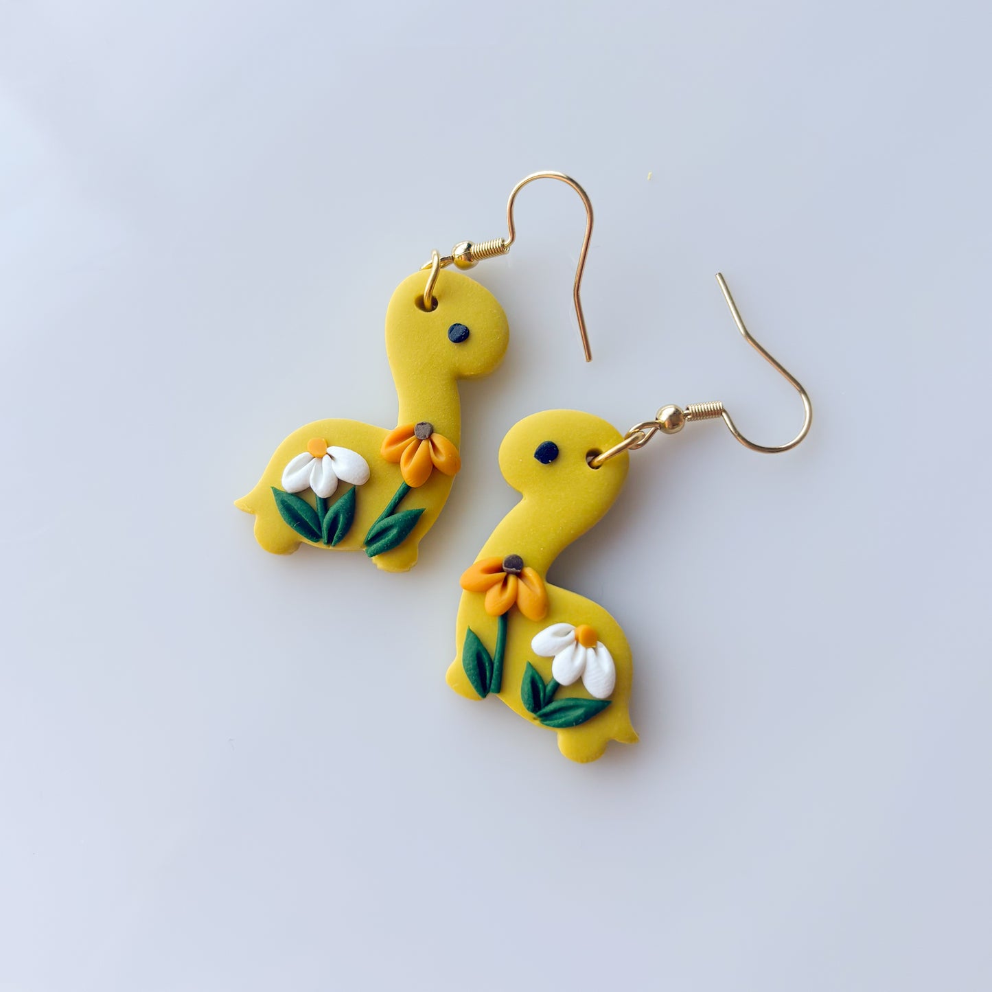 DAISY DINO EARRINGS (BRONTOS)