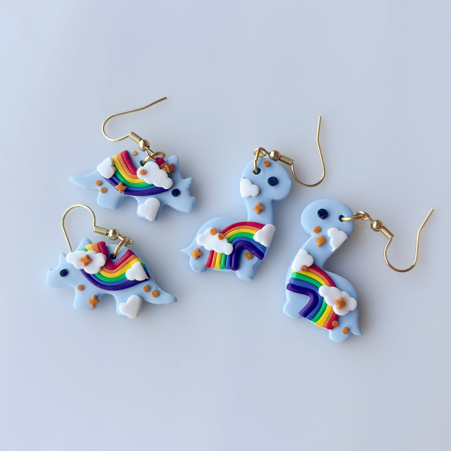 RAINBOW DINO EARRINGS (TRICERATOPS)