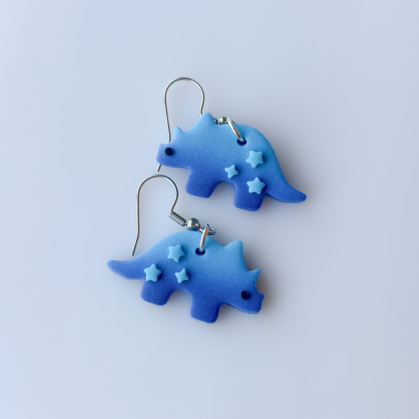 BLUE OMBRE DINO EARRINGS (TRICERATOPS)