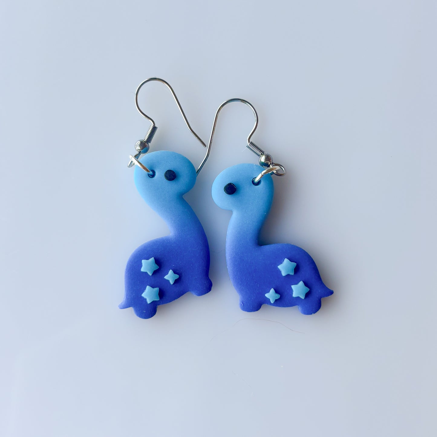 BLUE OMBRE DINO EARRINGS (BRONTO)