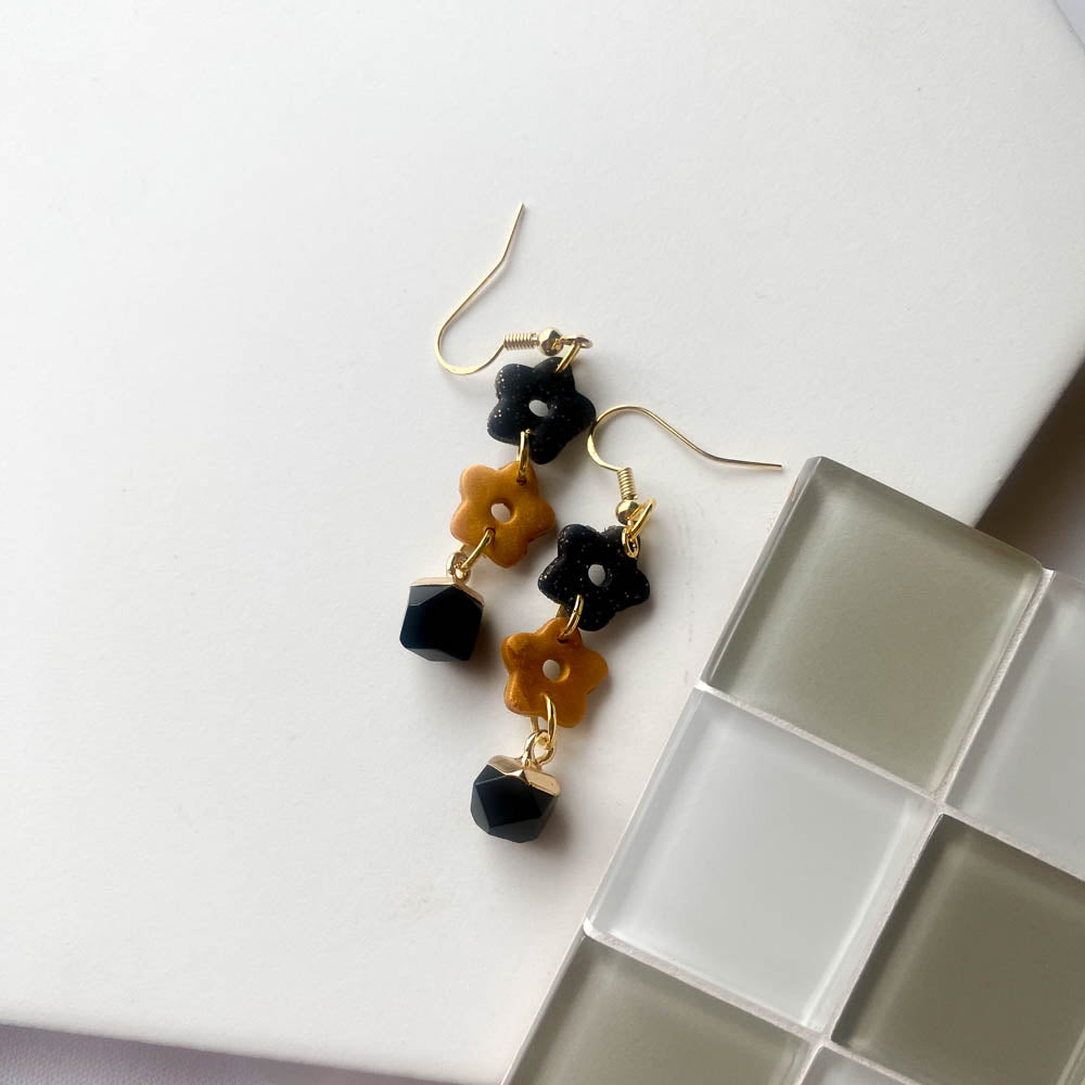 BLACK AND GOLD FLOWER DROP EARRINGS